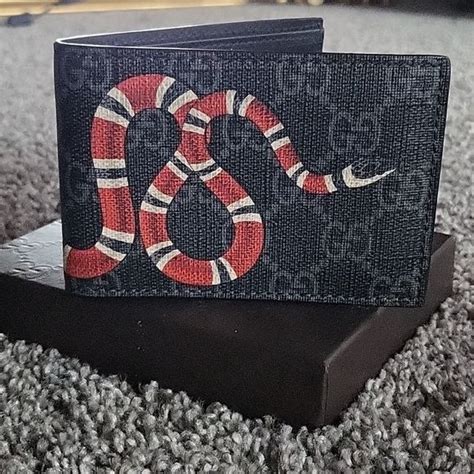 mens white gucci wallet|authentic gucci snake wallet.